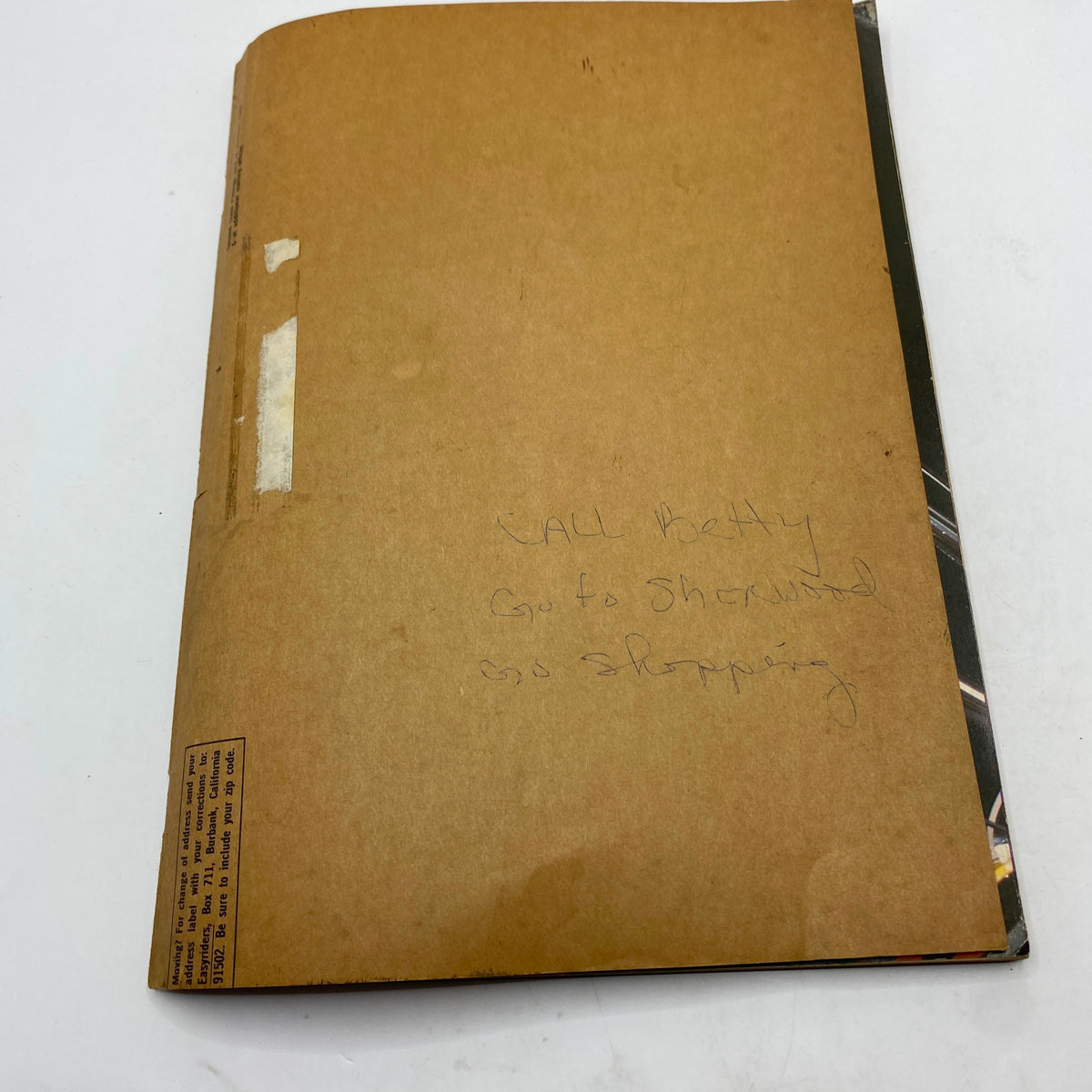 Back cover of the January 1983 Easyriders Magazine, featuring handwritten notes alongside a plain brown background.