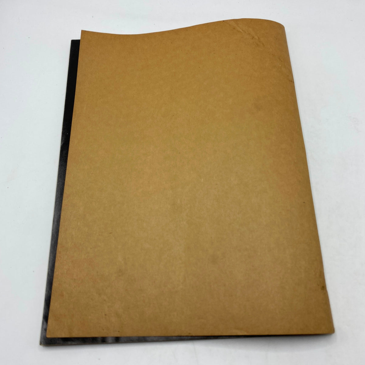 Another view of the back cover of VTG Easyriders Magazine April 1983, featuring a simple brown paper sleeve with no additional imagery.