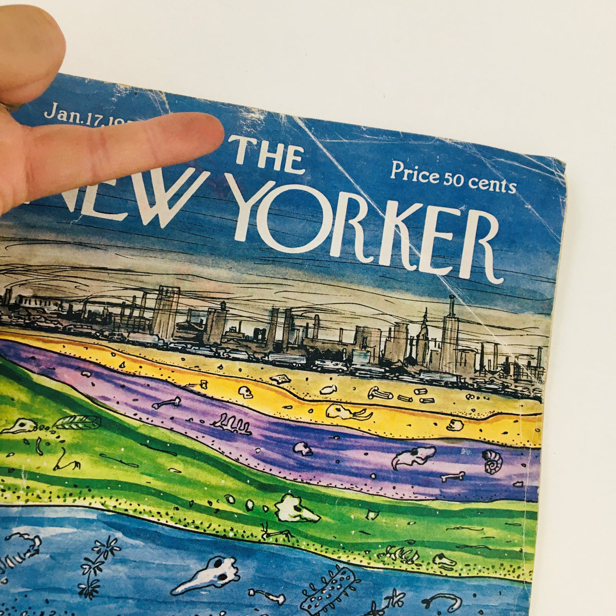 Close-up view of The New Yorker Magazine January 17, 1970 cover by Charles Addams, highlighting the vibrant colors and intricate details of the cartoonish landscape.