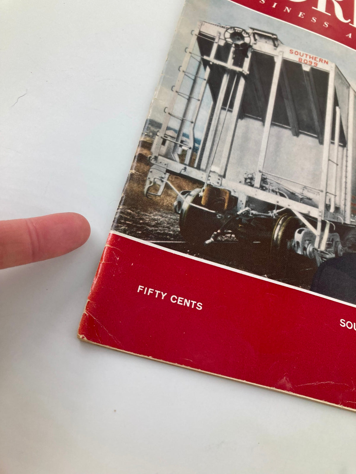 Close-up of the bottom corner of VTG Forbes Magazine March 15 1962 with emphasis on the price 'Fifty Cents' and Southern Railway's branding.