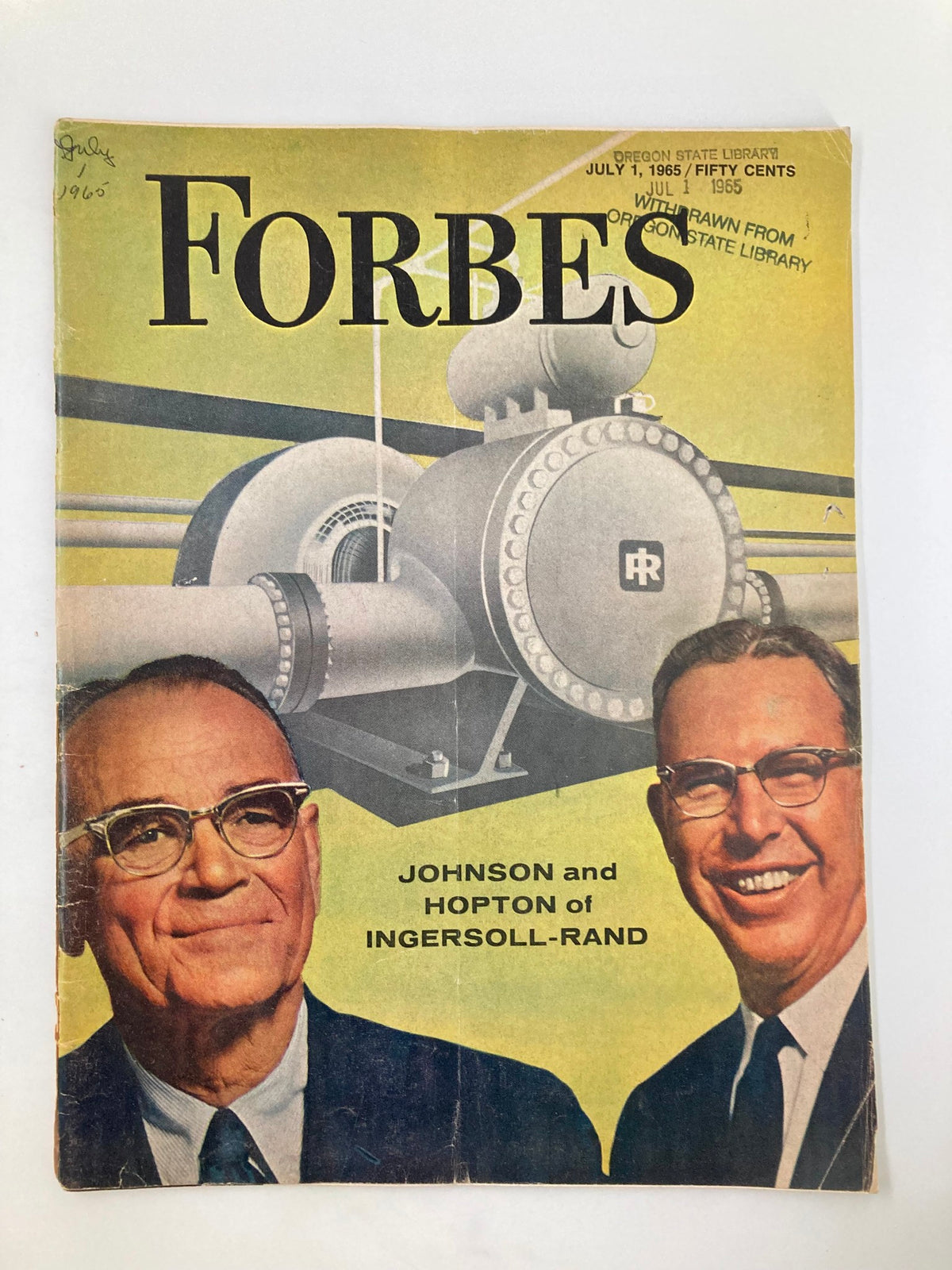 Cover of VTG Forbes Magazine July 1, 1985 featuring portraits of Johnson and Hopton of Ingersoll-Rand, reflecting the business culture of the 1980s.
