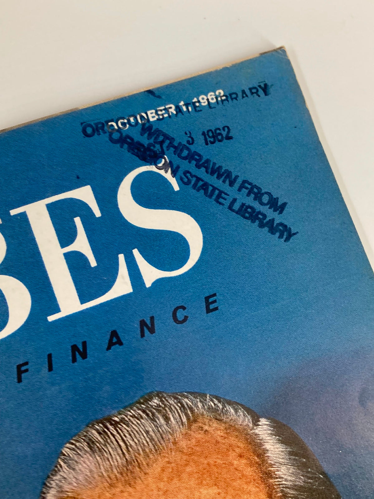 Details from the cover of VTG Forbes Magazine October 1, 1962, with a library stamp indicating withdrawal from Oregon State Library, showcasing the magazine's journey.
