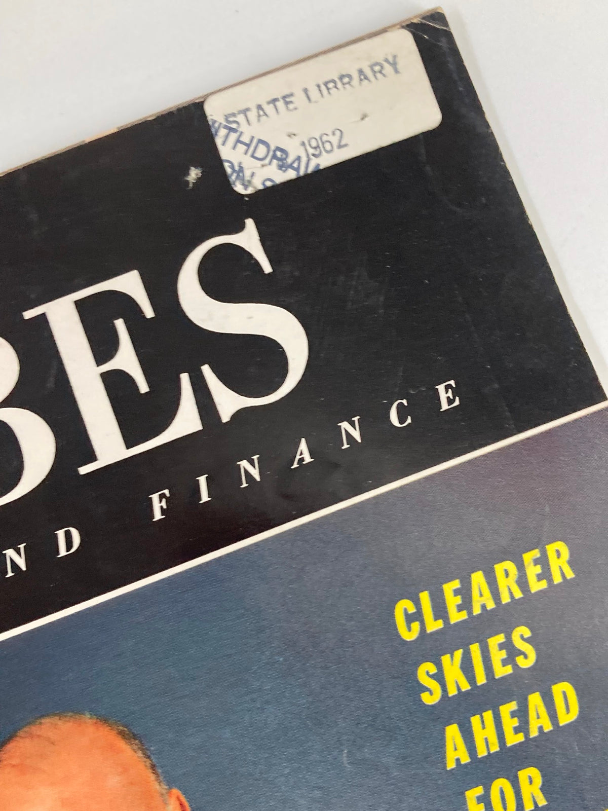 Side corner of the VTG Forbes Magazine May 1, 1962 featuring a label from a state library and the date on the cover.