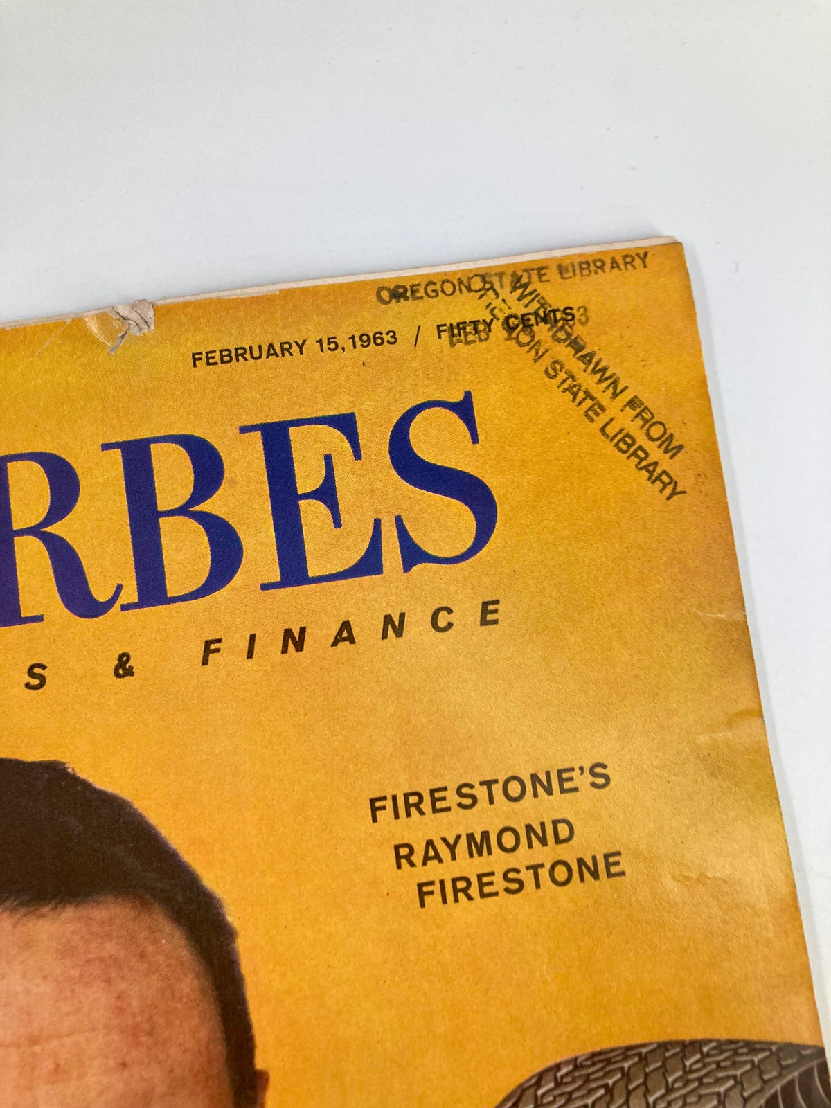 Close-up of the cover of VTG Forbes Magazine February 15, 1963 showing the title and details including Firestone's Raymond Firestone.