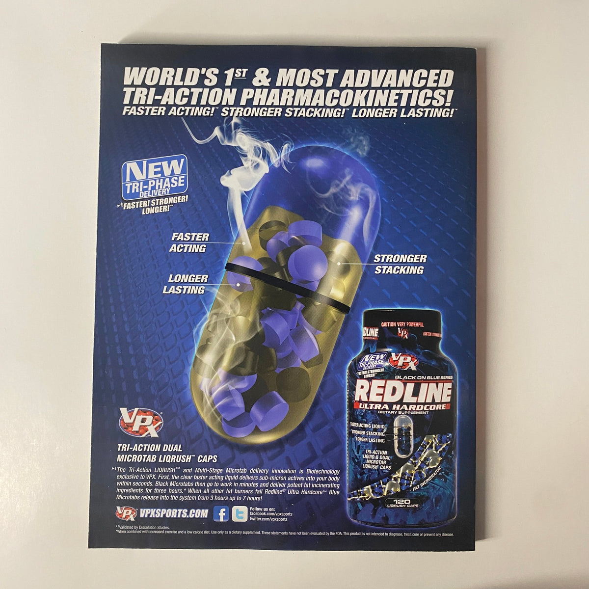 Advertisement for VPX Sports Redline Ultra Hardcore featured in Muscular Development Magazine March 2010. The ad promotes the world's first advanced tri-action pharmacokinetics with claims of faster acting and longer lasting results.