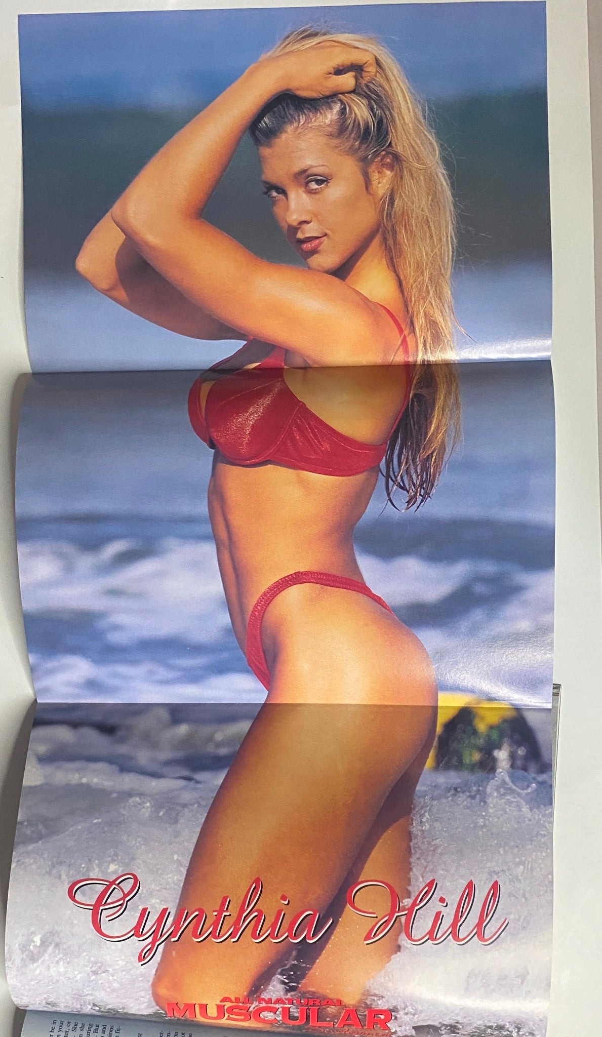 Muscular Development Magazine February 1998 featuring a pull-out poster of Cynthia Hill in a bikini, showcasing her physique, emphasizing natural bodybuilding and fitness.