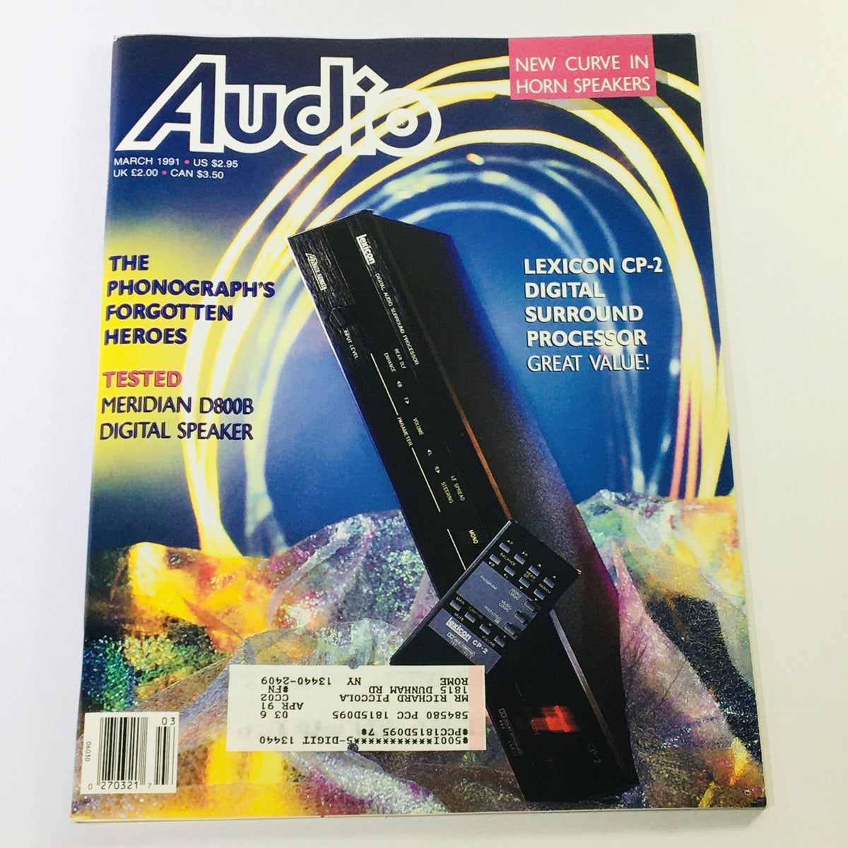 Cover of Audio Magazine March 1991 featuring the Meridian D800B Digital Speaker and Lexicon CP-2 Digital Surround Processor with colorful background design.