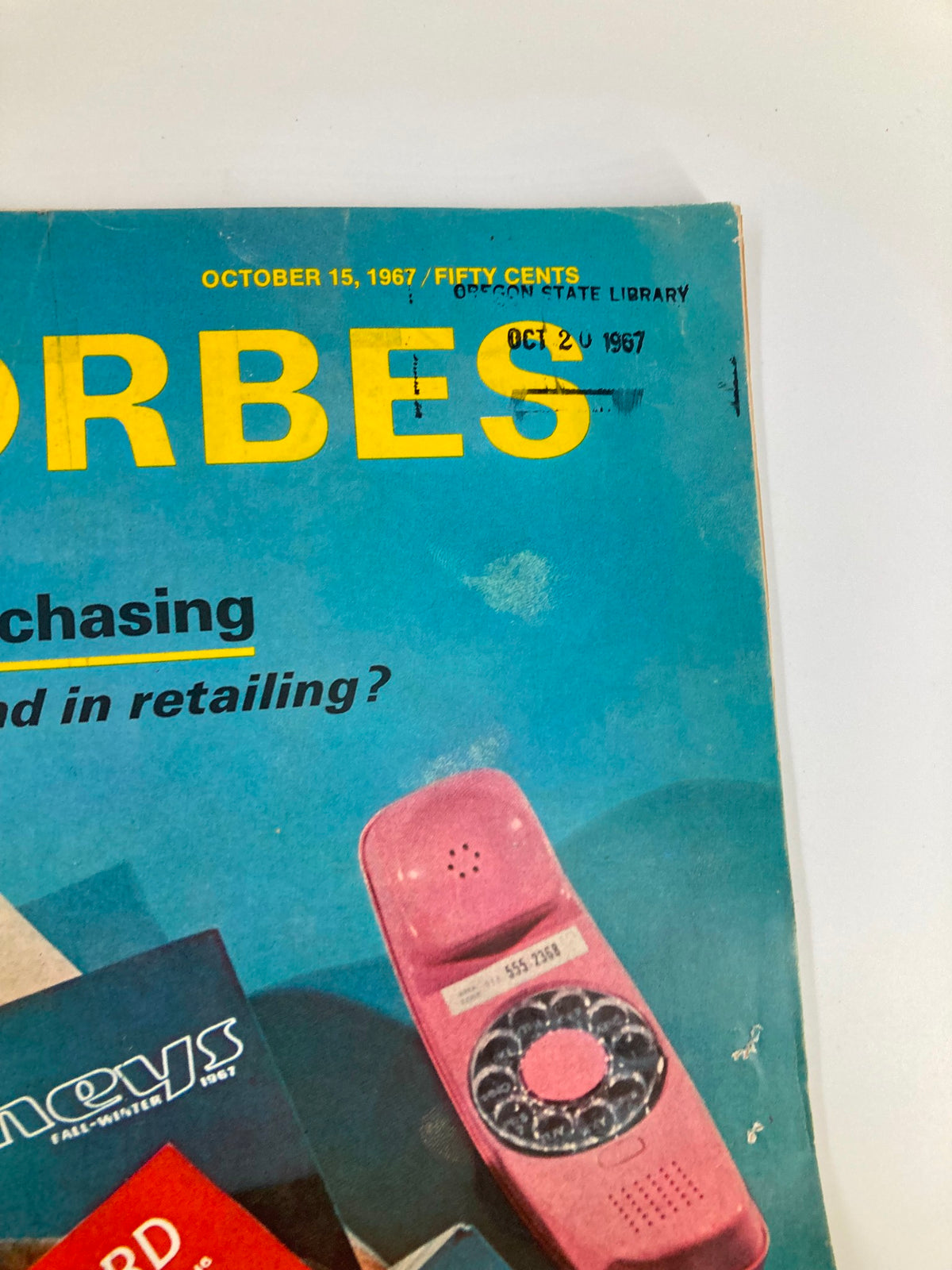 Another angle of the cover of VTG Forbes Magazine October 15, 1967, showcasing tele-purchasing and the magazine's title with markings from its history.