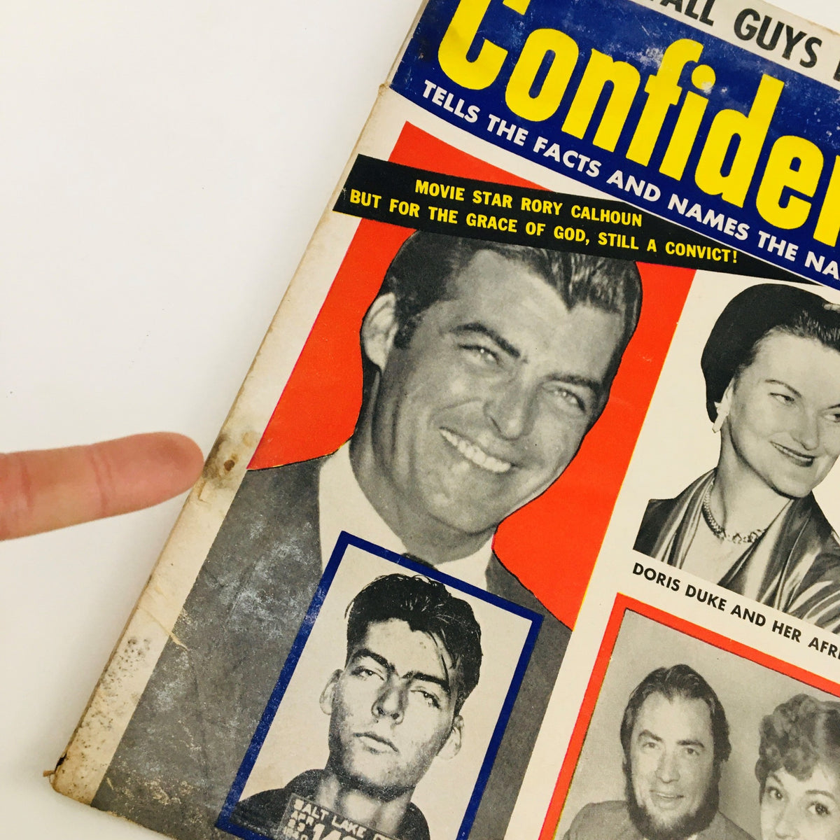 Close-up of Confidential Magazine May 1955 cover with Rory Calhoun's image, showcasing intriguing headlines and vibrant colors.