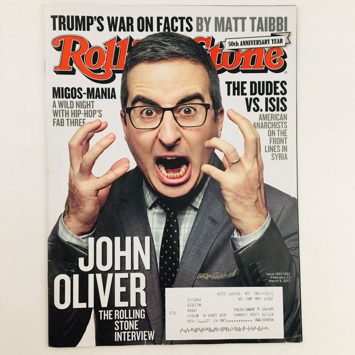Cover of Rolling Stone Magazine February 23 2017 featuring John Oliver with an expressive pose in a suit, addressing the topic 'The Dudes vs The ISIS.'