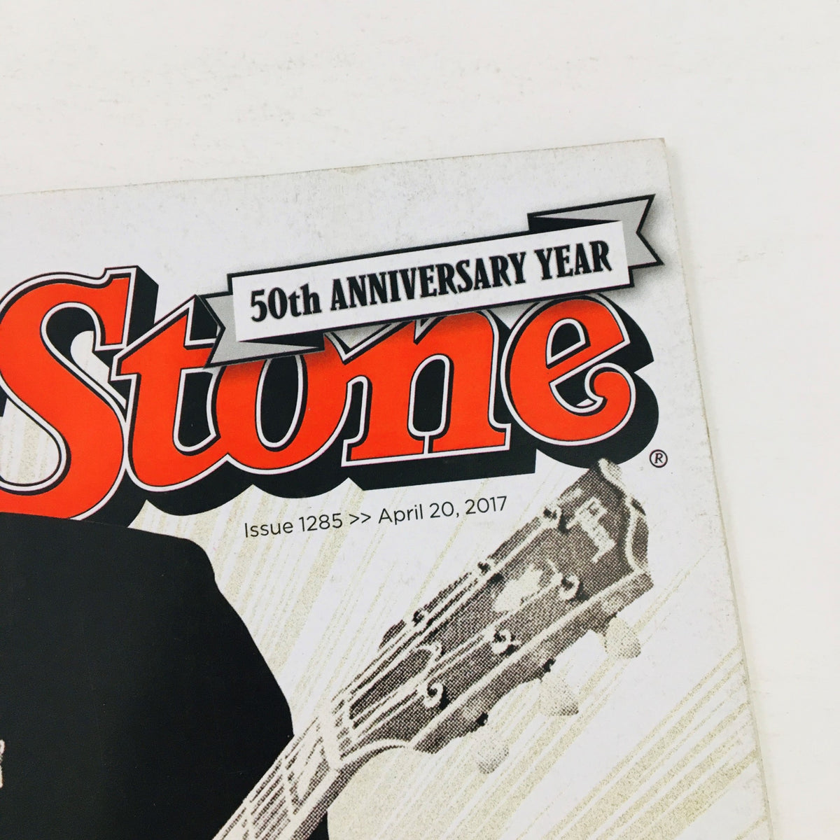 Close-up of Rolling Stone Magazine title from the April 20, 2017 issue, highlighting the 50th Anniversary Year and featuring Chuck Berry.