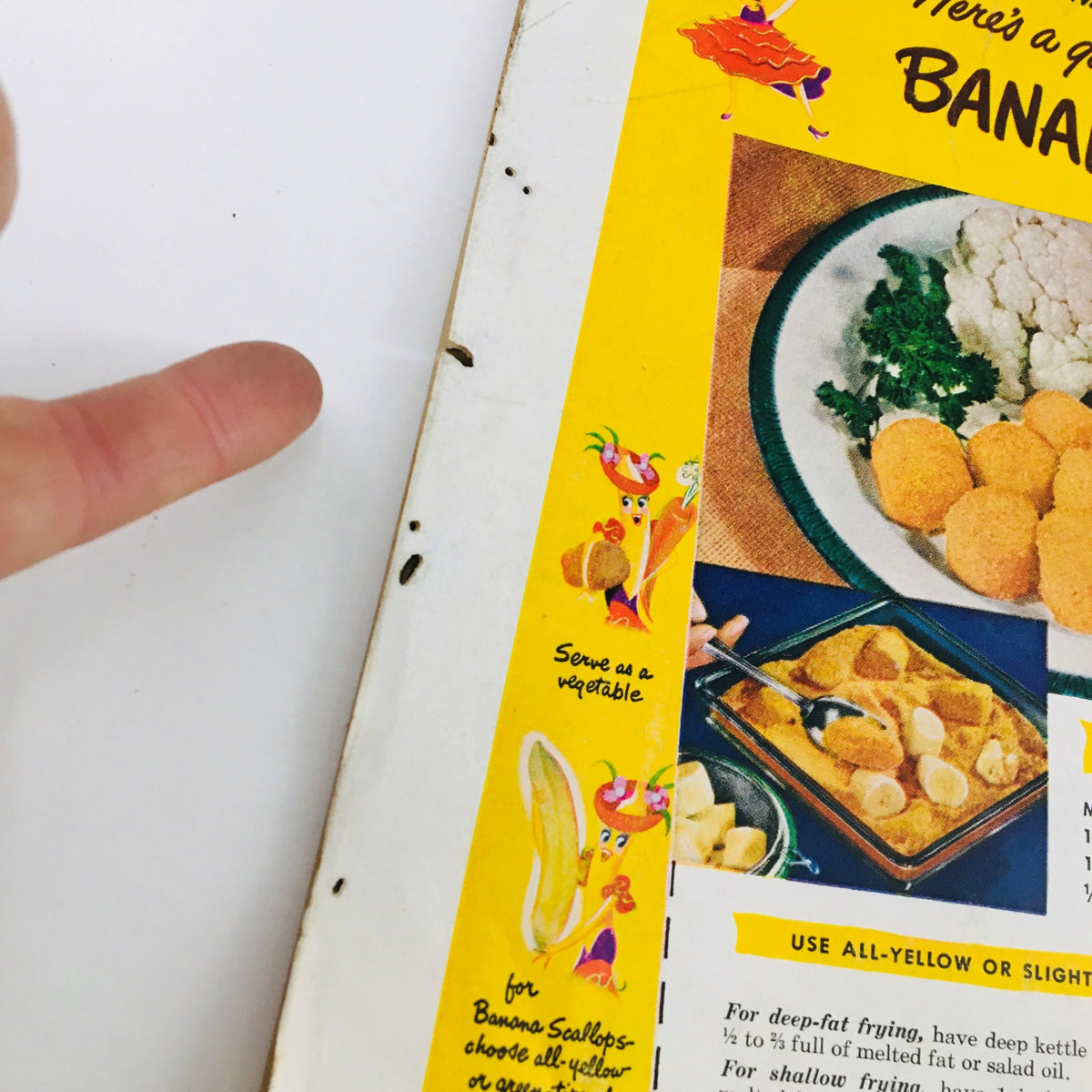Recipe page from Woman's Day Magazine January 1948 displaying a colorful illustration of banana scallops, capturing mid-20th century culinary trends.