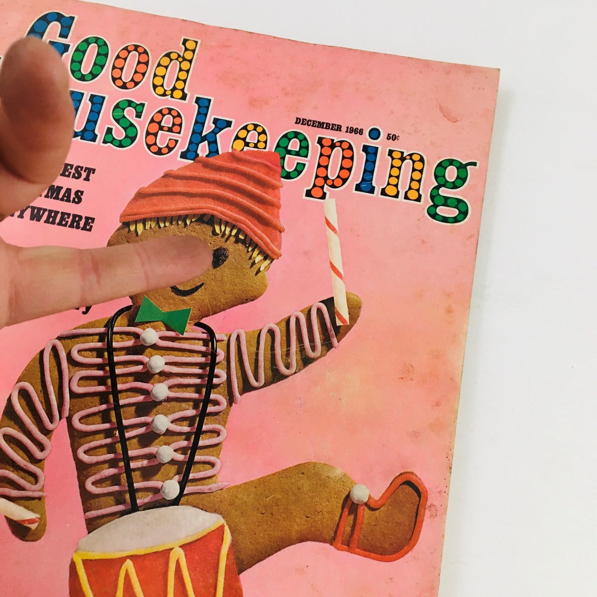Cover of Good Housekeeping Magazine from December 1966 featuring a whimsical gingerbread figure dressed in festive attire, showcasing holiday spirit.