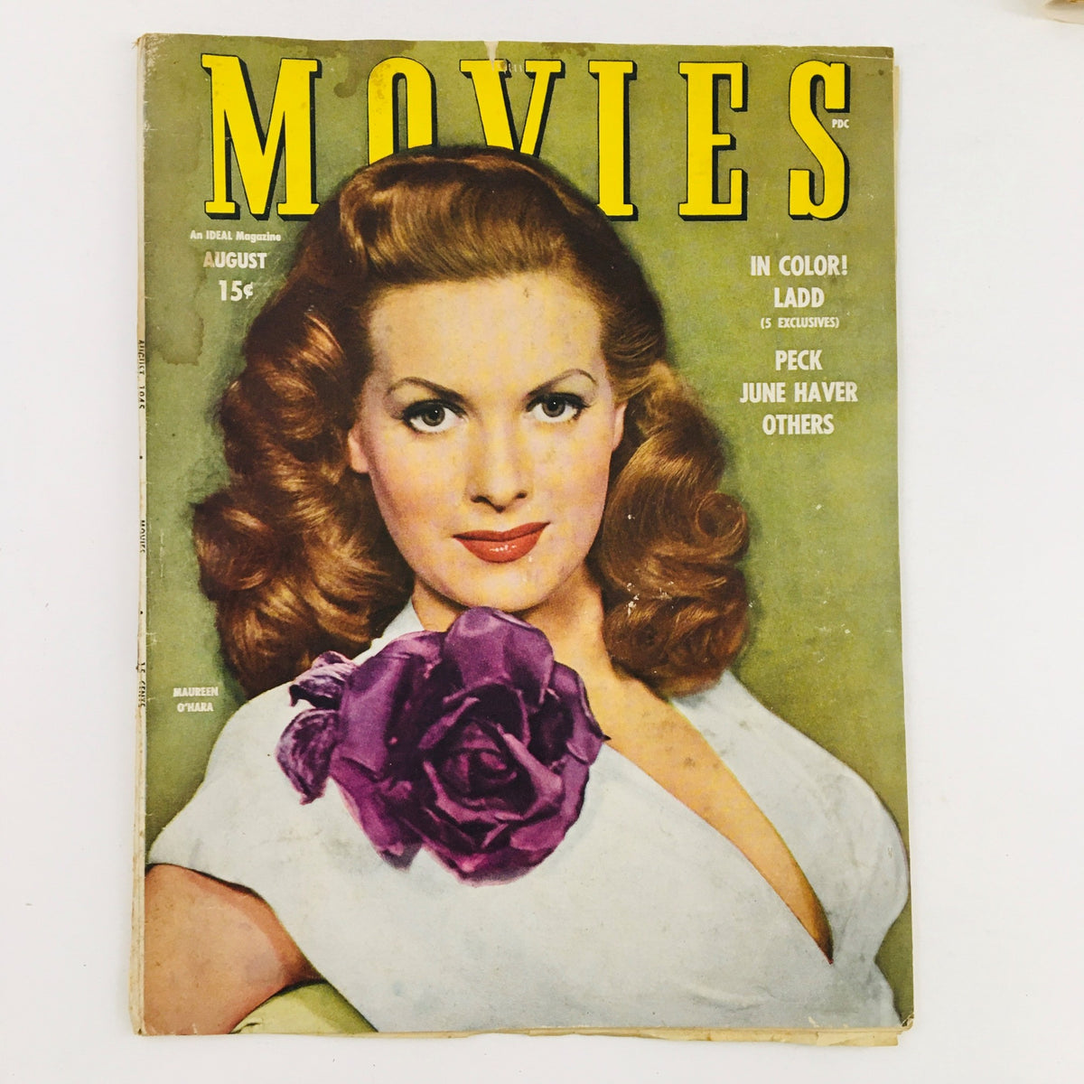 VTG Movies Magazine August 1945 featuring Maureen O'Hara on the cover with a purple rose, showcasing classic Hollywood cinema of post-war America.