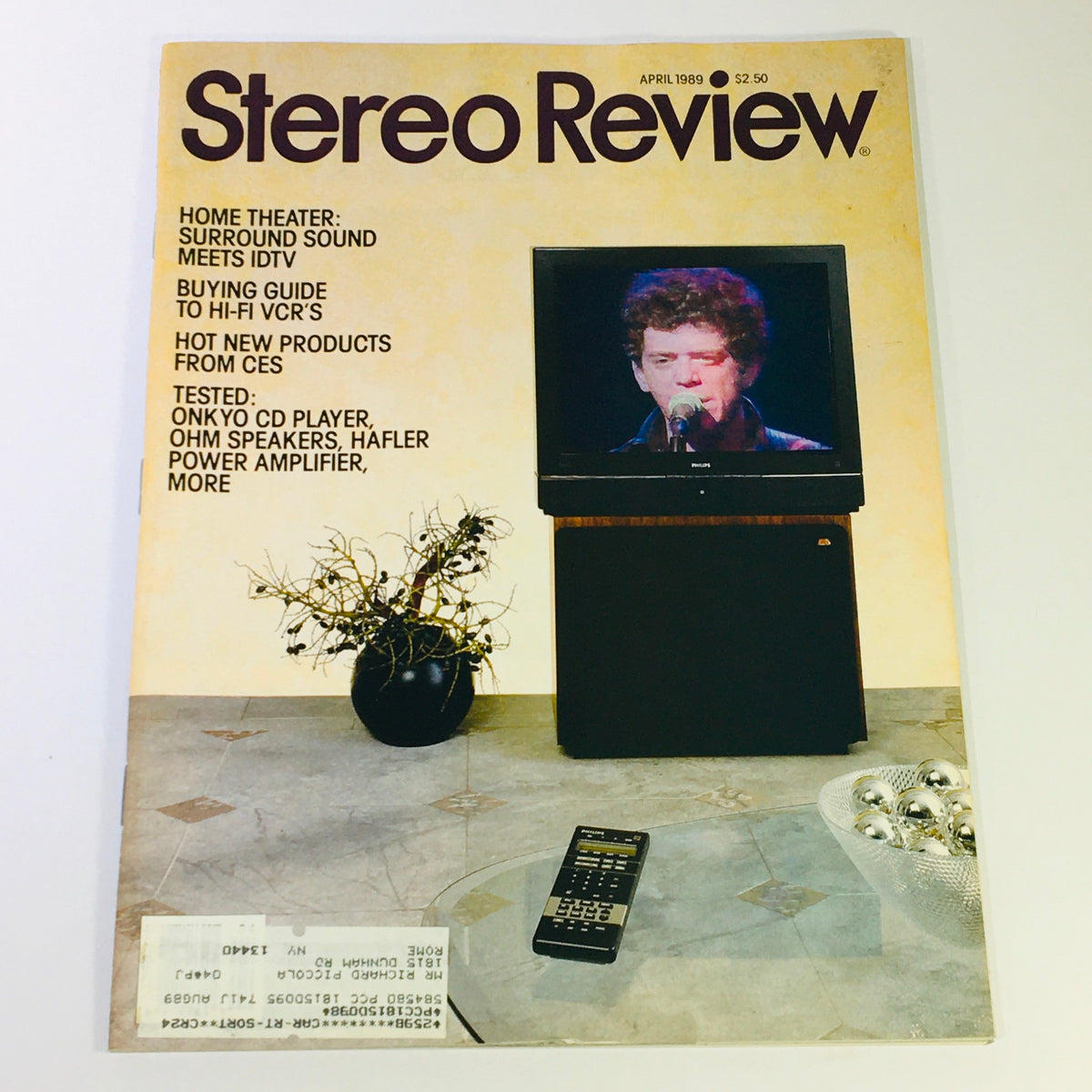 VTG Stereo Review Magazine April 1989 featuring Onkyo CD Player and OHM Speakers Tested, showcasing a retro living room scene with a TV, a plant, and a remote control on a coffee table.