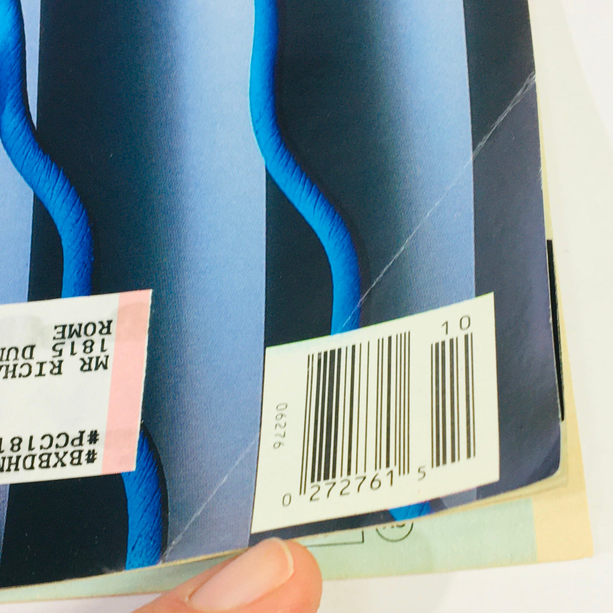 Close-up view of the back cover of Stereo Review Magazine October 1992 with address label and barcode, displaying the magazine's vibrant blue design and detailing.