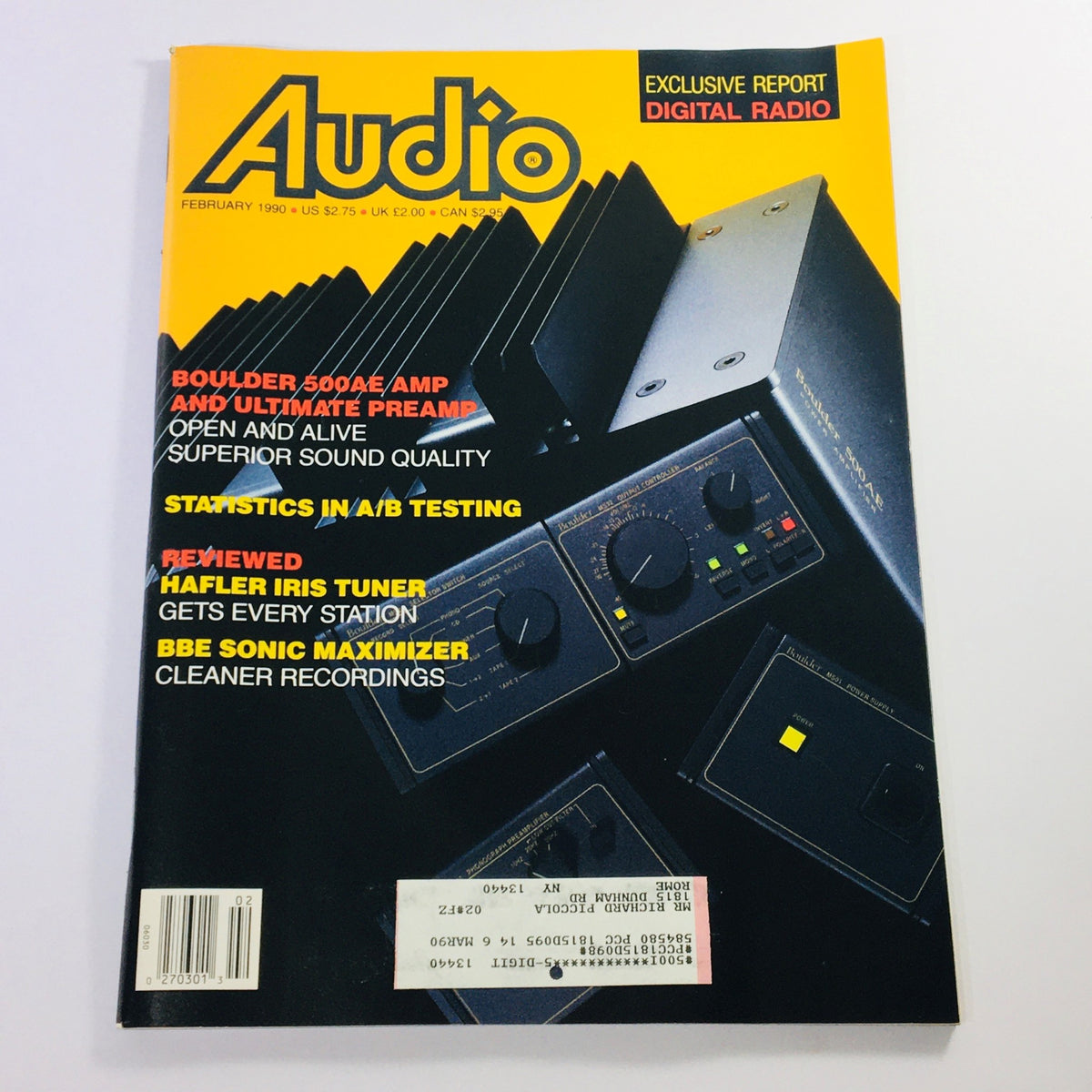 Audio Magazine February 1990 issue featuring an article on the Hafler Iris Tuner and BBE Sonic Maximizer. The cover showcases technical audio equipment with prominent headlines on sound quality, A/B testing, and audio advancements.
