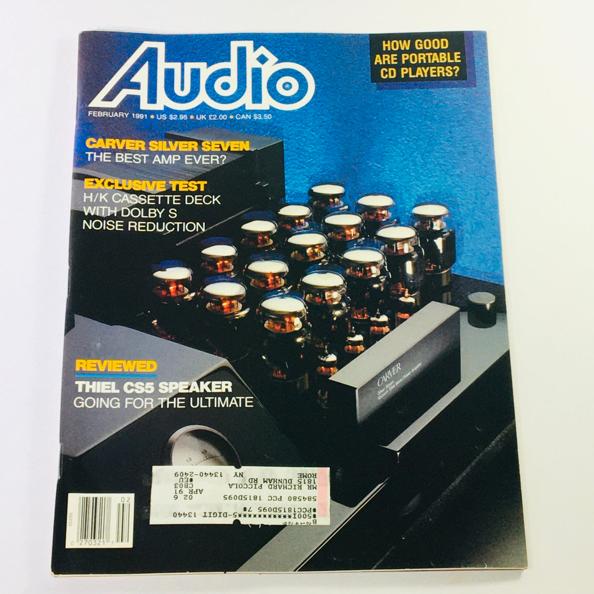 Cover of Audio Magazine February 1991 featuring Carver Silver Seven amplifier and H/K Cassette Deck with Dolby technology, highlighting vintage audio equipment and technology.