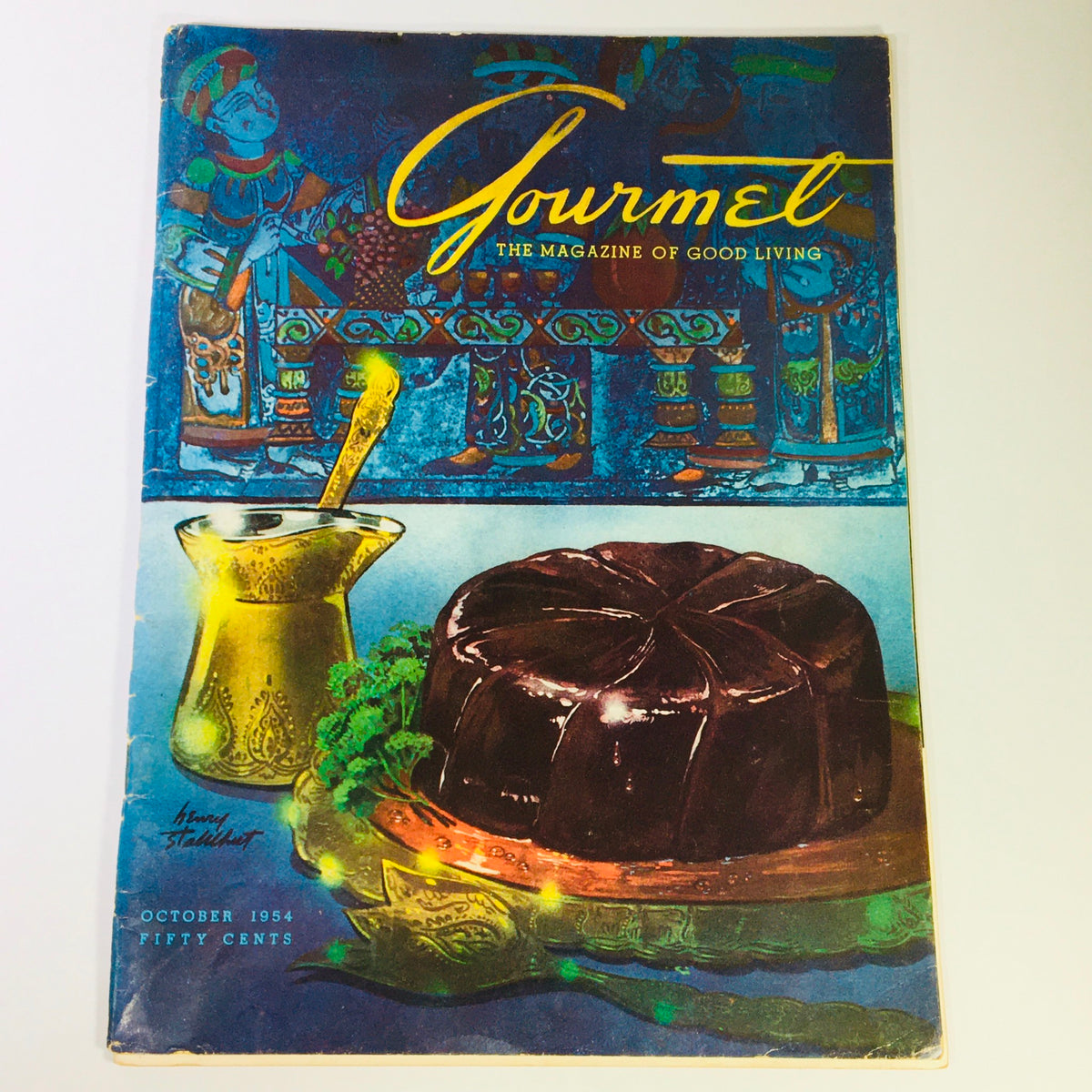 Cover of VTG Gourmet The Magazine of Good Living October 1954, featuring a colorful illustration of a dessert and a decorative bottle.