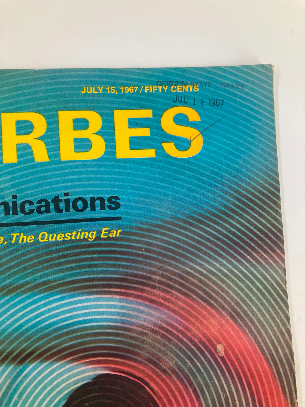 Close-up view of the cover of VTG Forbes Magazine from July 15, 1967, highlighting the title 'Communications: The Searching Eye & Questing Ear' and markings showing the publication date