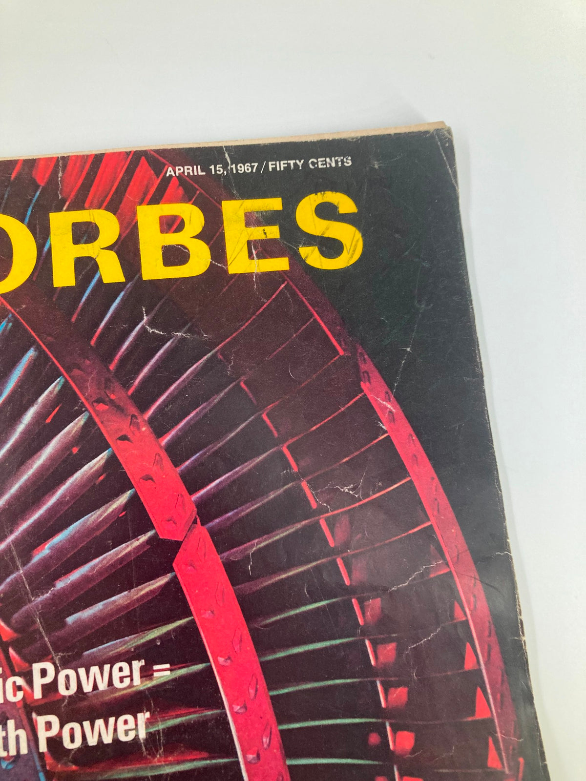 Detailed view of the top portion of the cover of VTG Forbes Magazine April 15, 1967, highlighting the publication date and magazine title.