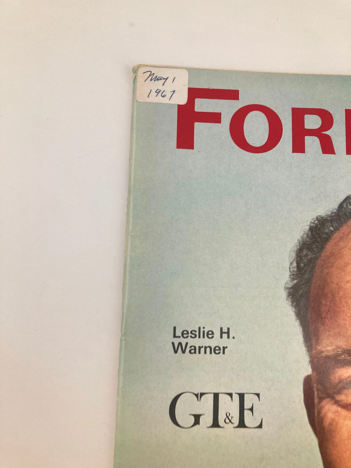 Close-up of the top corner of VTG Forbes Magazine May 1 1967, showing the publication date and name 'Leslie H. Warner' alongside the GT&E logo.