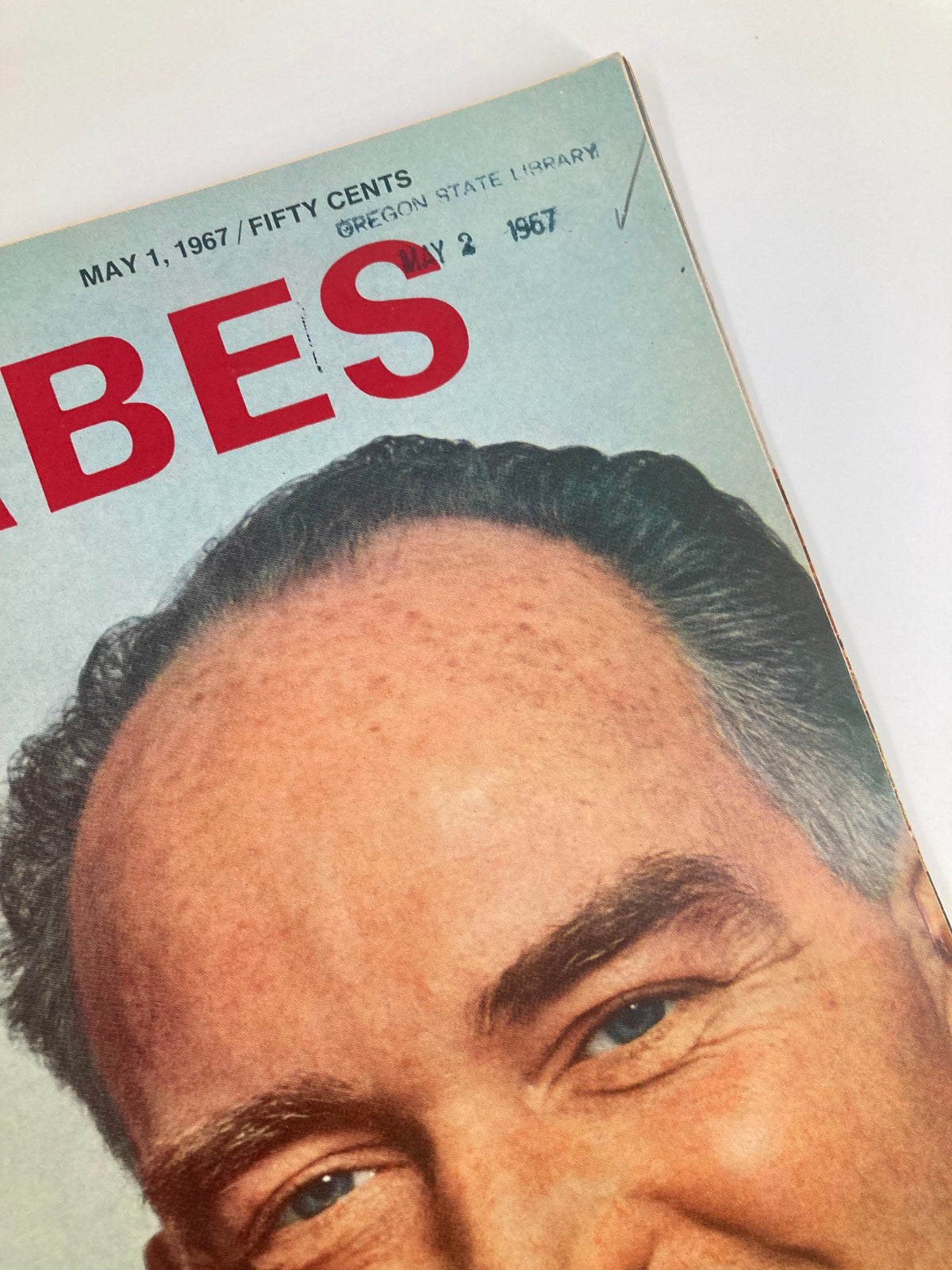 Side view of the top section of VTG Forbes Magazine May 1 1967 displaying the issue details, including the date and library mark.