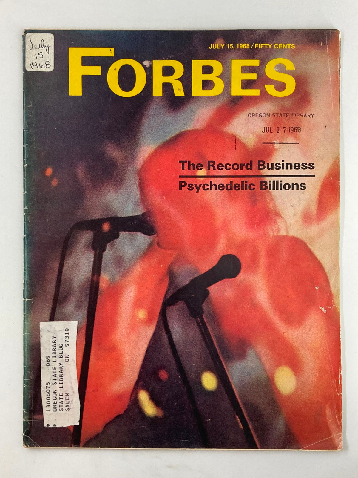 Front cover of the vintage Forbes magazine dated July 15, 1968, featuring the title 'The Record Business: Psychedelic Billion,' highlighting a colorful design with microphones and a psychedelic background.