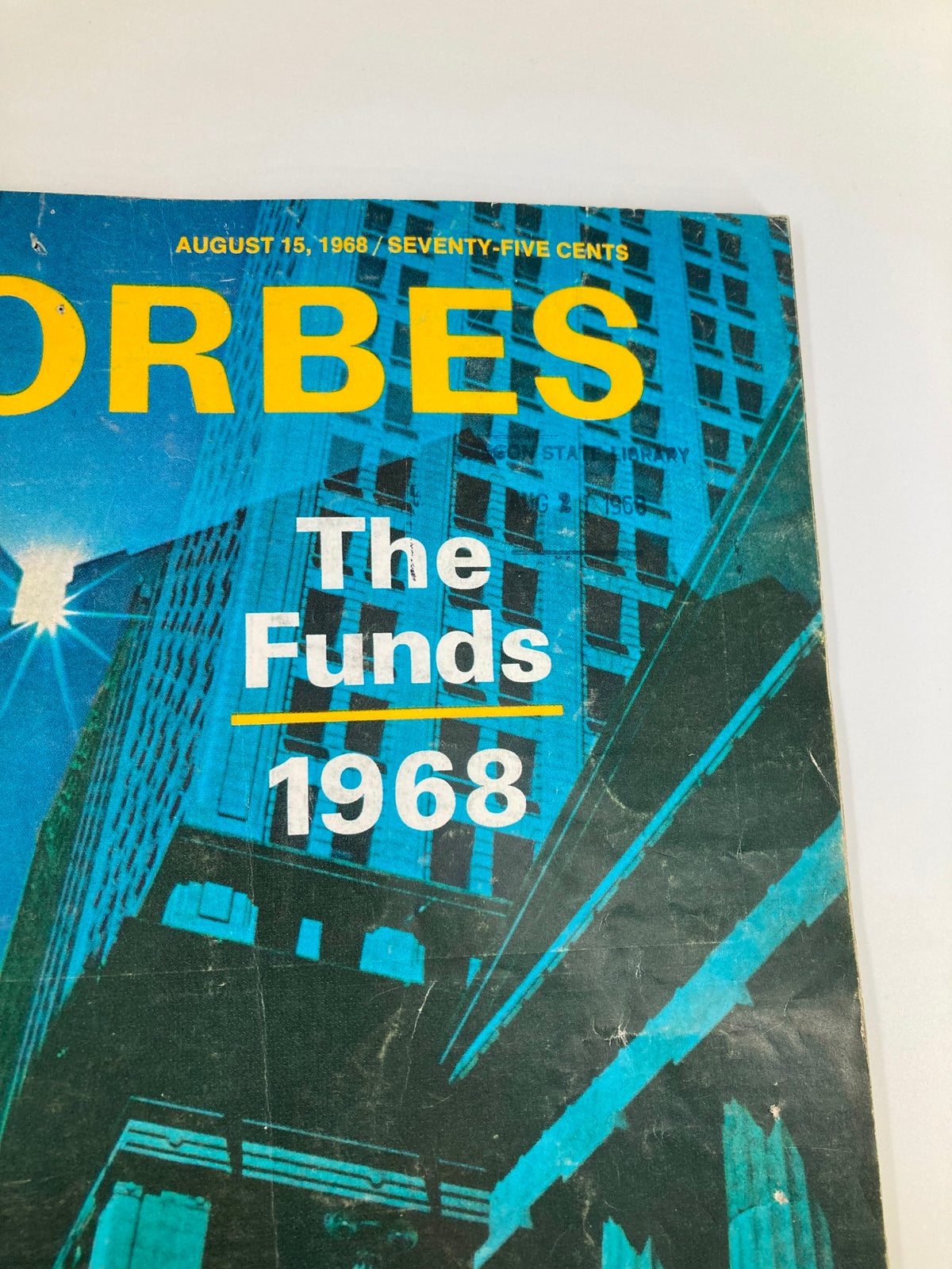 Detailed view of the title 'Forbes' and 'The Funds 1968' on the cover of VTG Forbes Magazine August 15 1968 against a blue background.