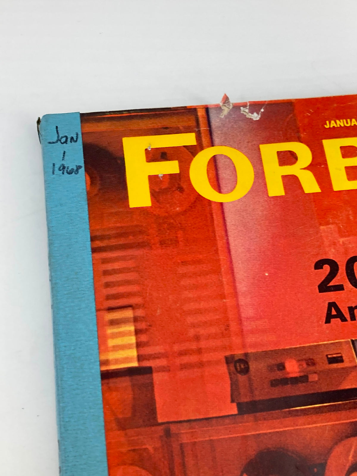Close-up view of the Vintage Forbes Magazine January 1 1968 cover featuring the publication date and title related to American Industry.