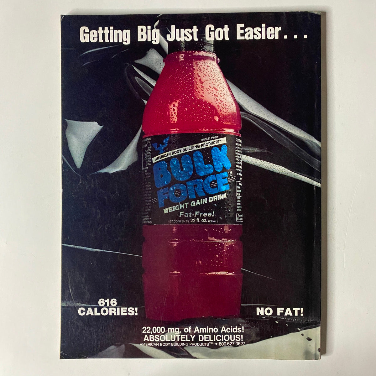 Advertisement for Bulk Force weight gain drink featured in IronMan Magazine May 1992 Vol 51 No. 5, emphasizing its calorie content and amino acids.