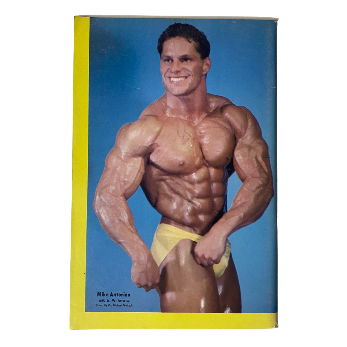 Cover photo of IronMan Magazine November 1982 Volume 42 Number 1 showcasing Mike Antorino, a bodybuilder, highlighting his muscular physique.
