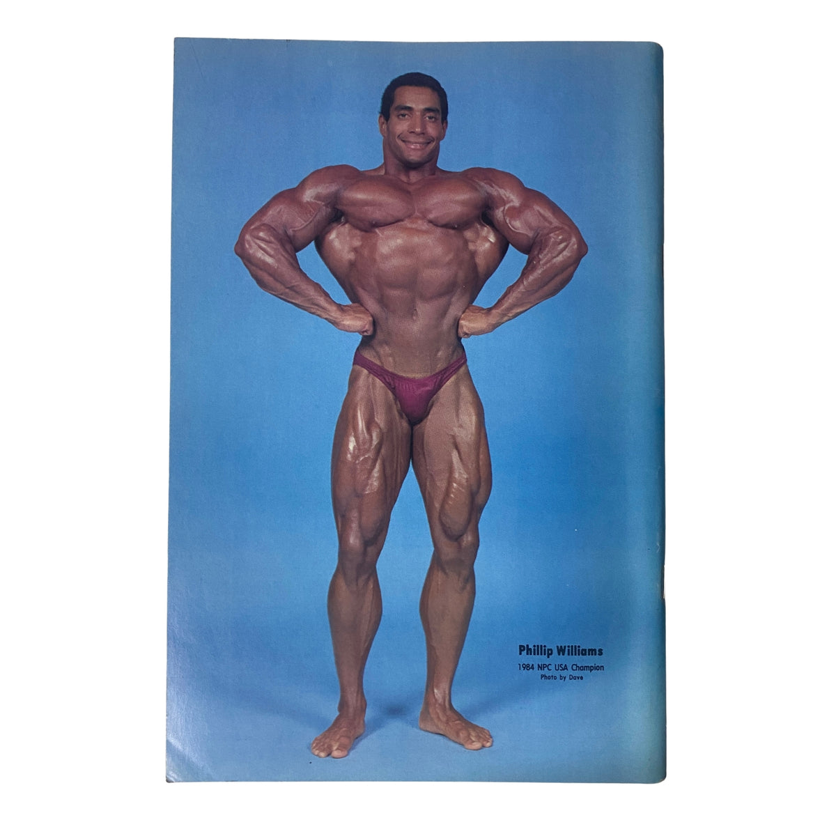 Inside feature page of IronMan Magazine January 1985 Vol 44 No. 2 showcasing Phillip Williams, a competitor from the 1985 IFBB USA Championships, posing in a maroon swimsuit.