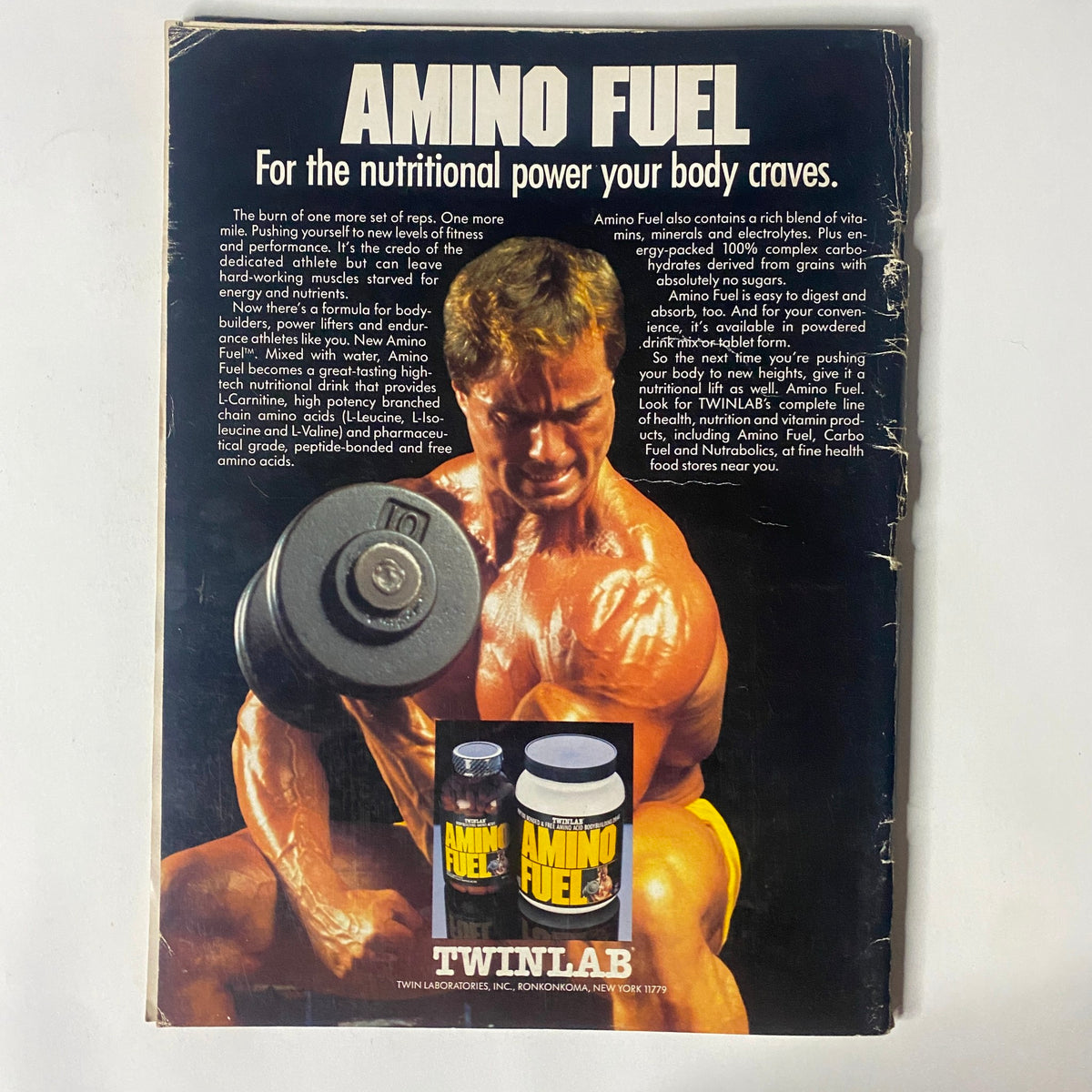 Advertisement for Amino Fuel from Twinlab featured in IronMan Magazine May 1987 Vol 46 No. 4, promoting nutritional supplements for bodybuilding.