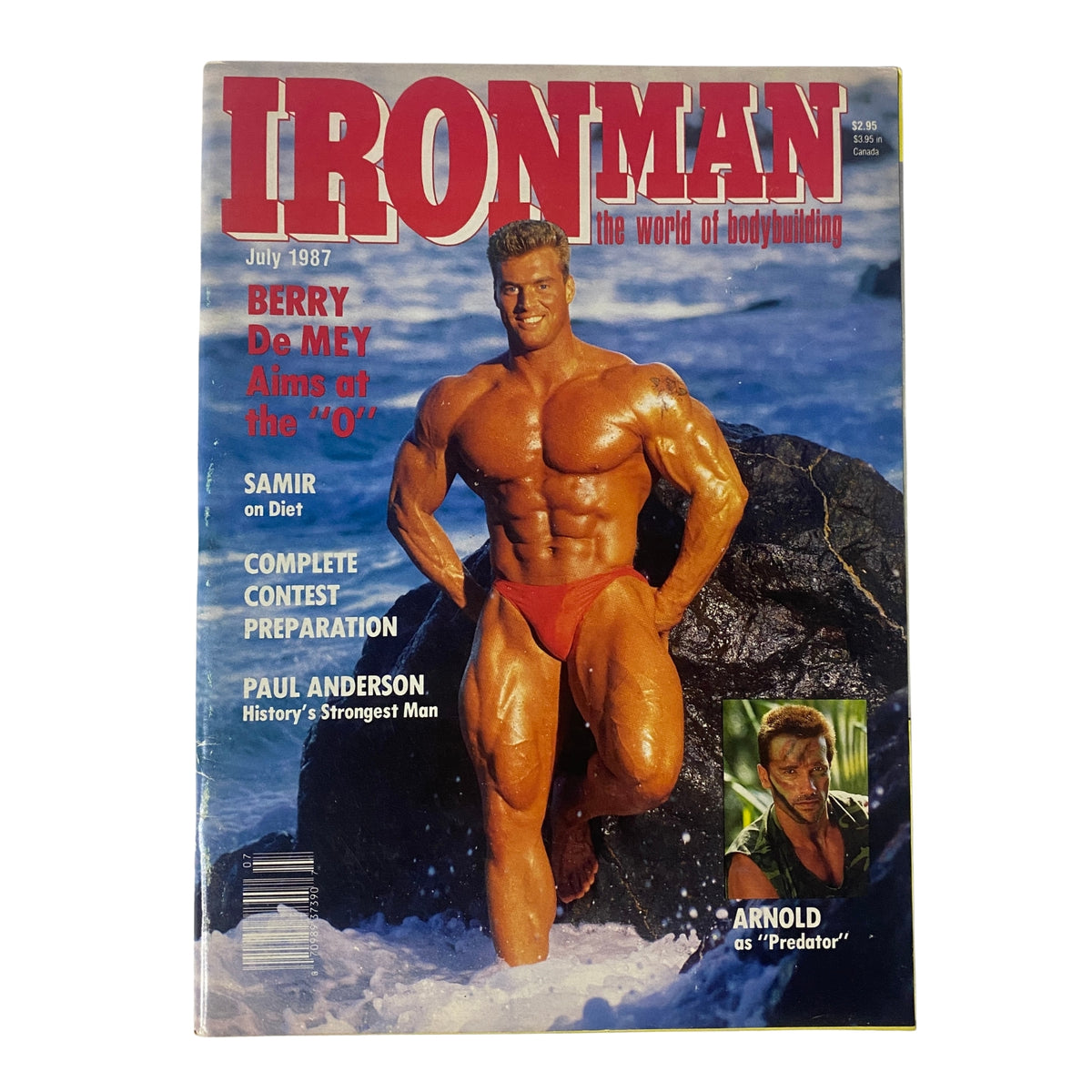 Cover of IronMan Magazine July 1987, featuring Berry De Mey, showcasing muscular physique with focus on aesthetics in bodybuilding. Includes articles on diet, contest preparation, and Arnold Schwarzenegger.