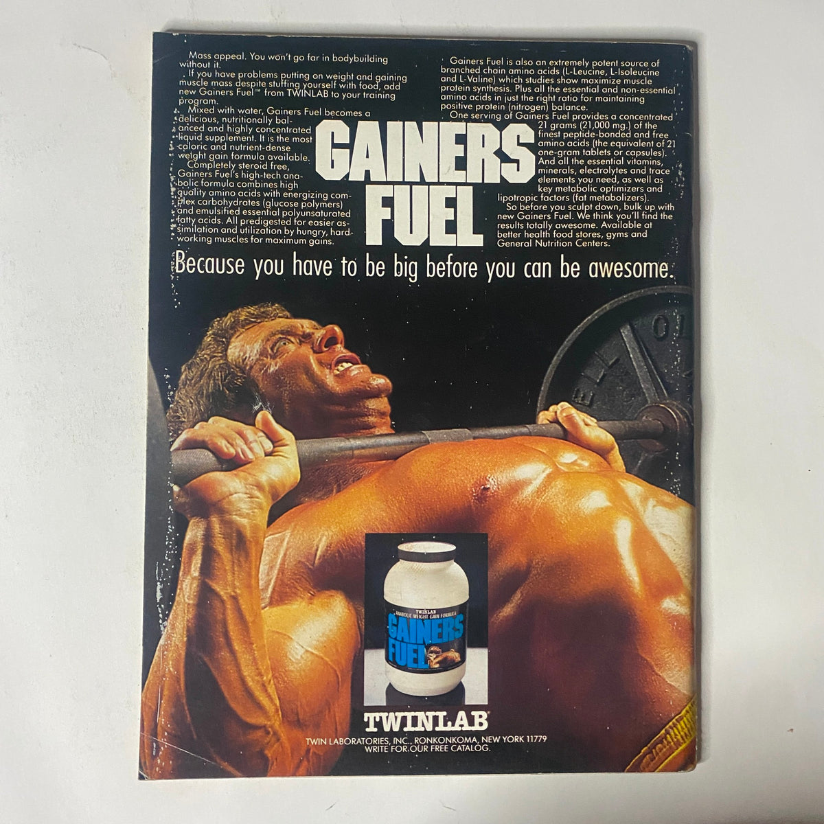 Back cover of IronMan Magazine, April 1988, promoting Gainer's Fuel with an image of a muscular bodybuilder illustrating the slogan 'Because you have to be big before you can be awesome.'