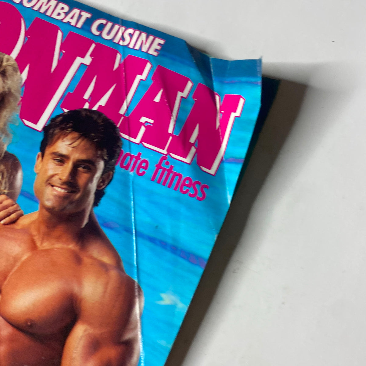 Close-up of IronMan Magazine, July 1991, Vol. 50 No. 7 showcasing Francis Benfatto and Tonya Knight against a blue background, highlighting fitness features.