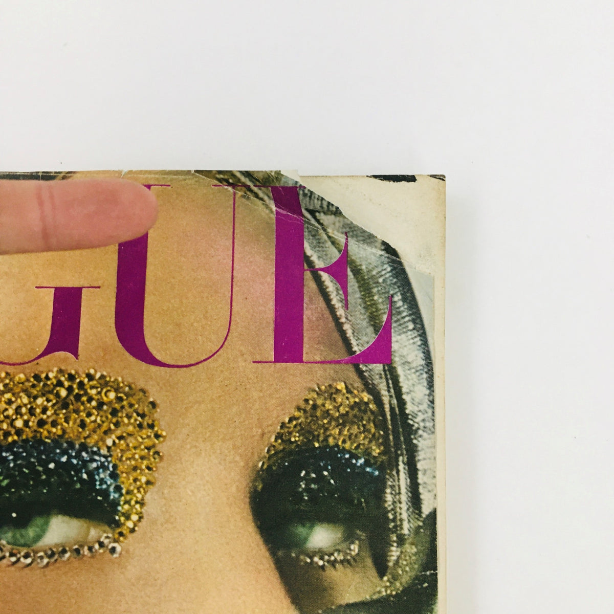 VTG Vogue Magazine December 1964 Wonders for the Christmas Eyes - Detailed view of the magazine title highlighting vintage fashion features.