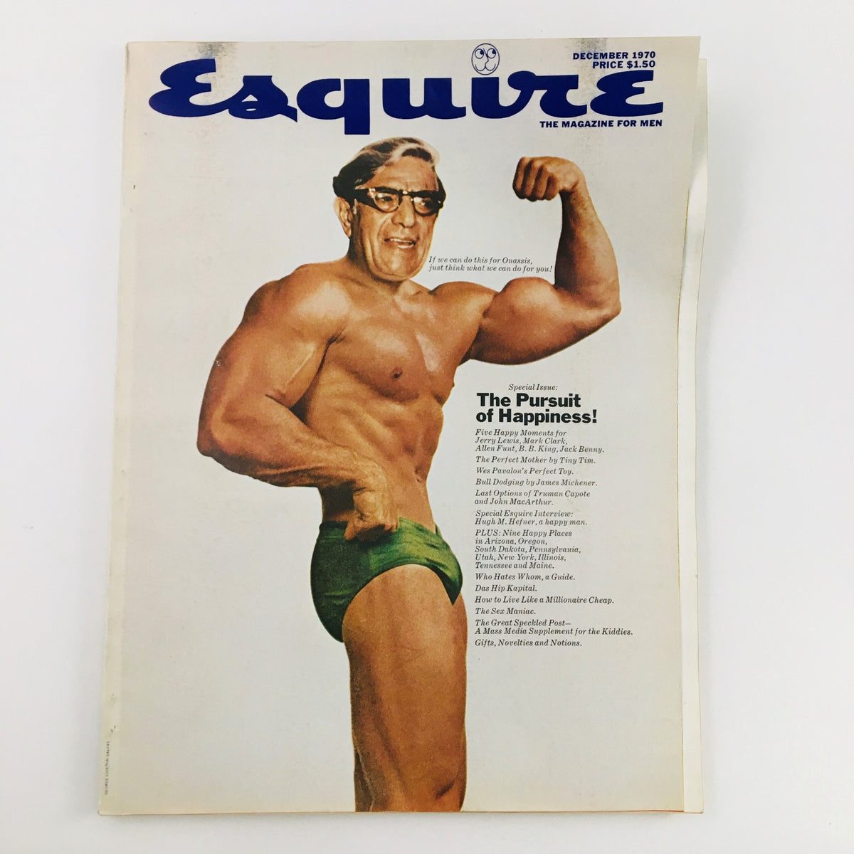 Esquire Magazine December 1970 cover featuring a muscular man flexing, highlighting the special issue titled 'The Pursuit of Happiness!'. Collectible vintage magazine showcasing a blend of masculinity and style.