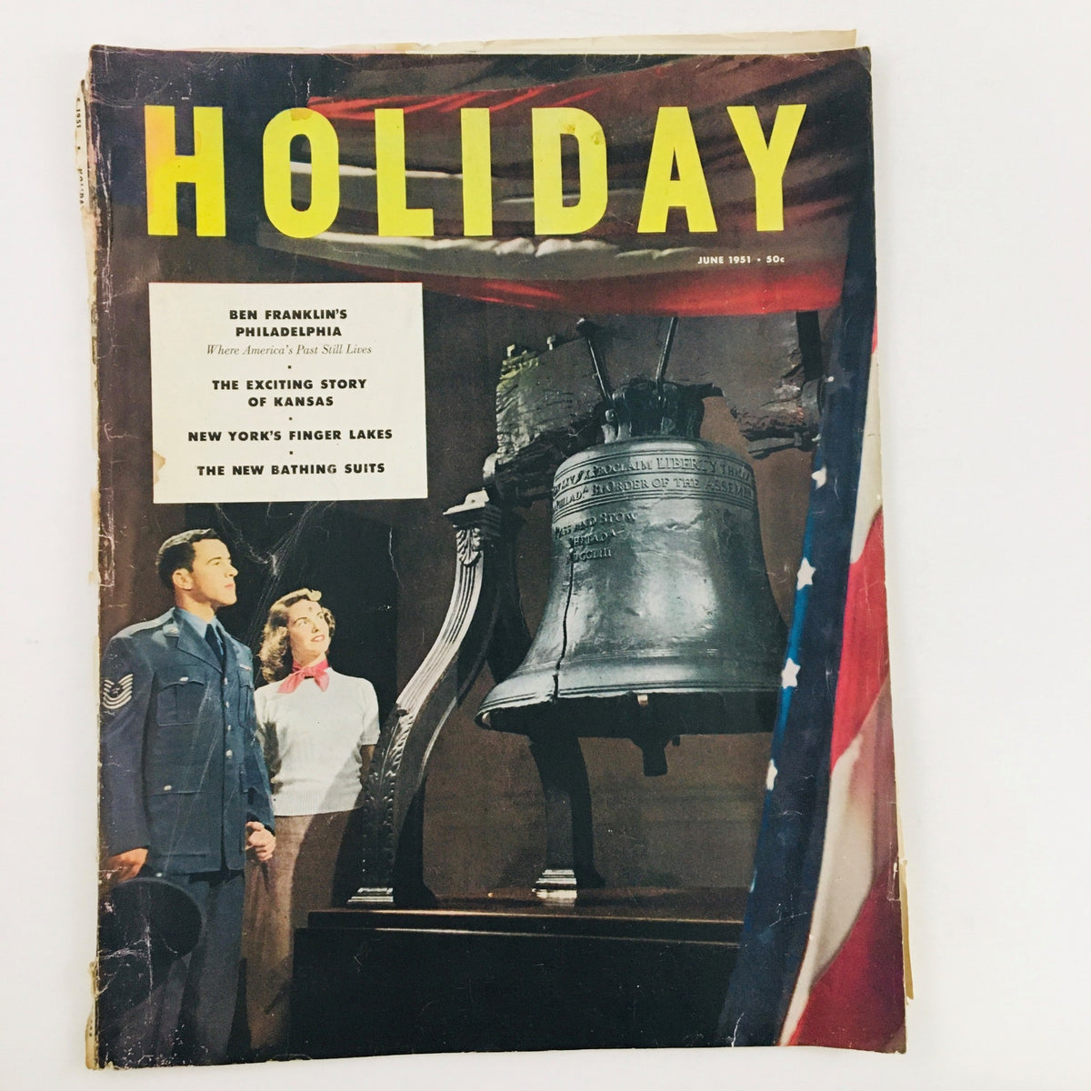 Cover of the VTG Holiday Magazine June 1951 featuring Ben Franklin's Philadelphia, showcasing a vintage design with a prominent bell and a couple admiring it.