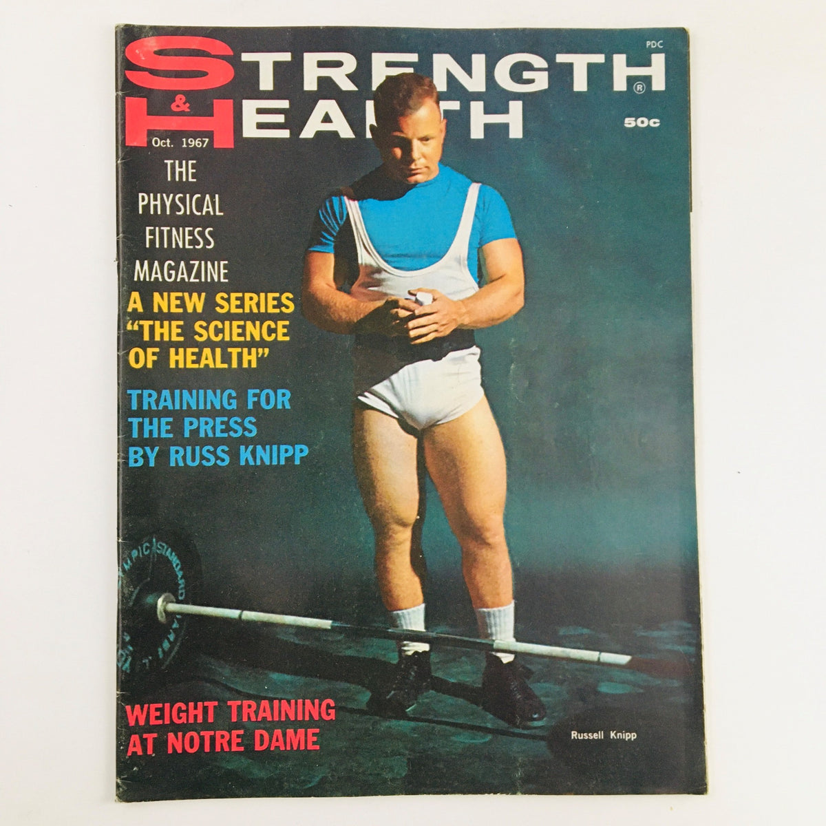 Cover of Strength & Health Magazine October 1967 featuring bodybuilder Russell Knipp, showcasing vintage fitness culture and bodybuilding history.