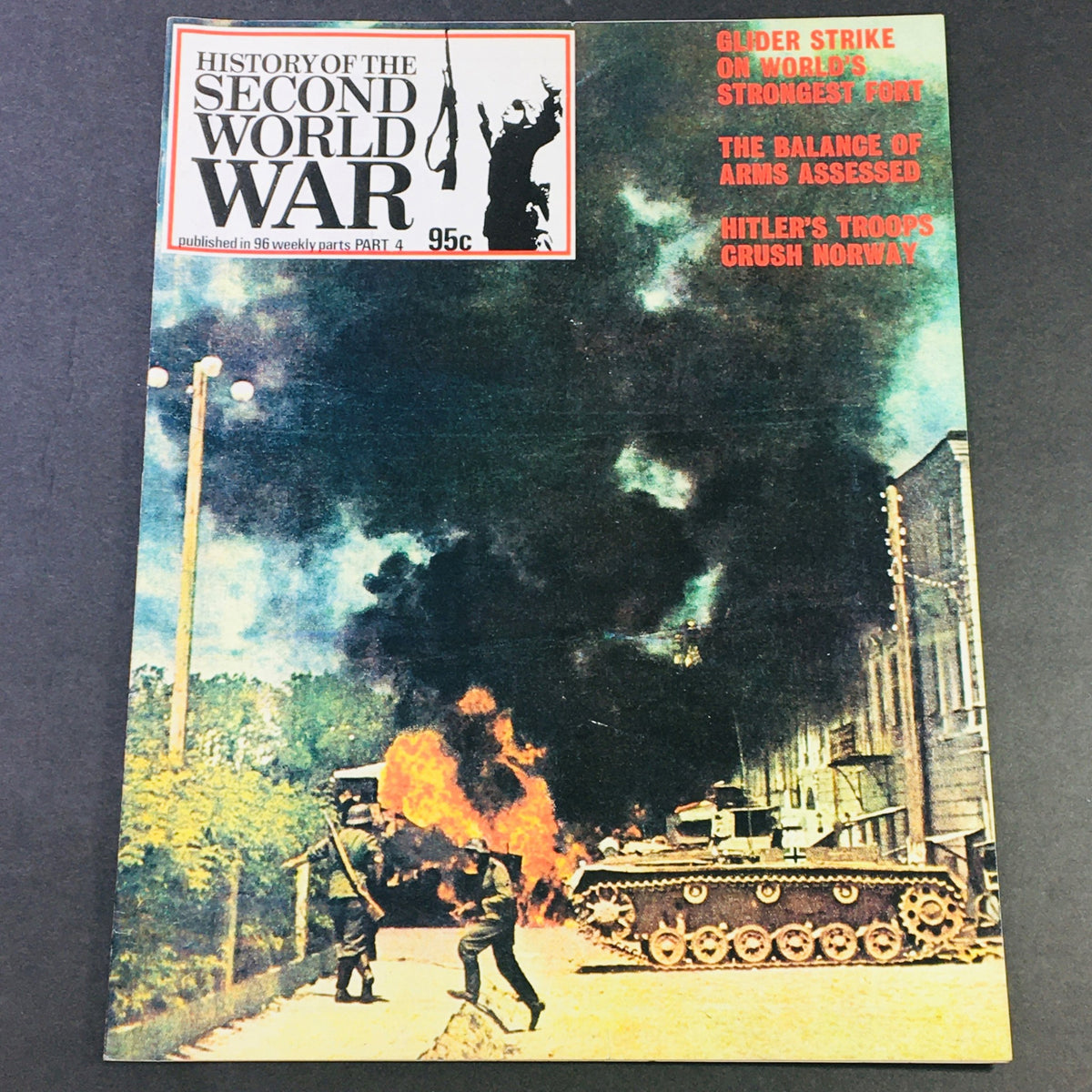 Vintage magazine cover titled 'History of the Second World War Part 4 1973 - Hitler's Troops Crash Norway', featuring dramatic imagery of a WWII scene with explosions and soldiers amidst smoke and chaos.