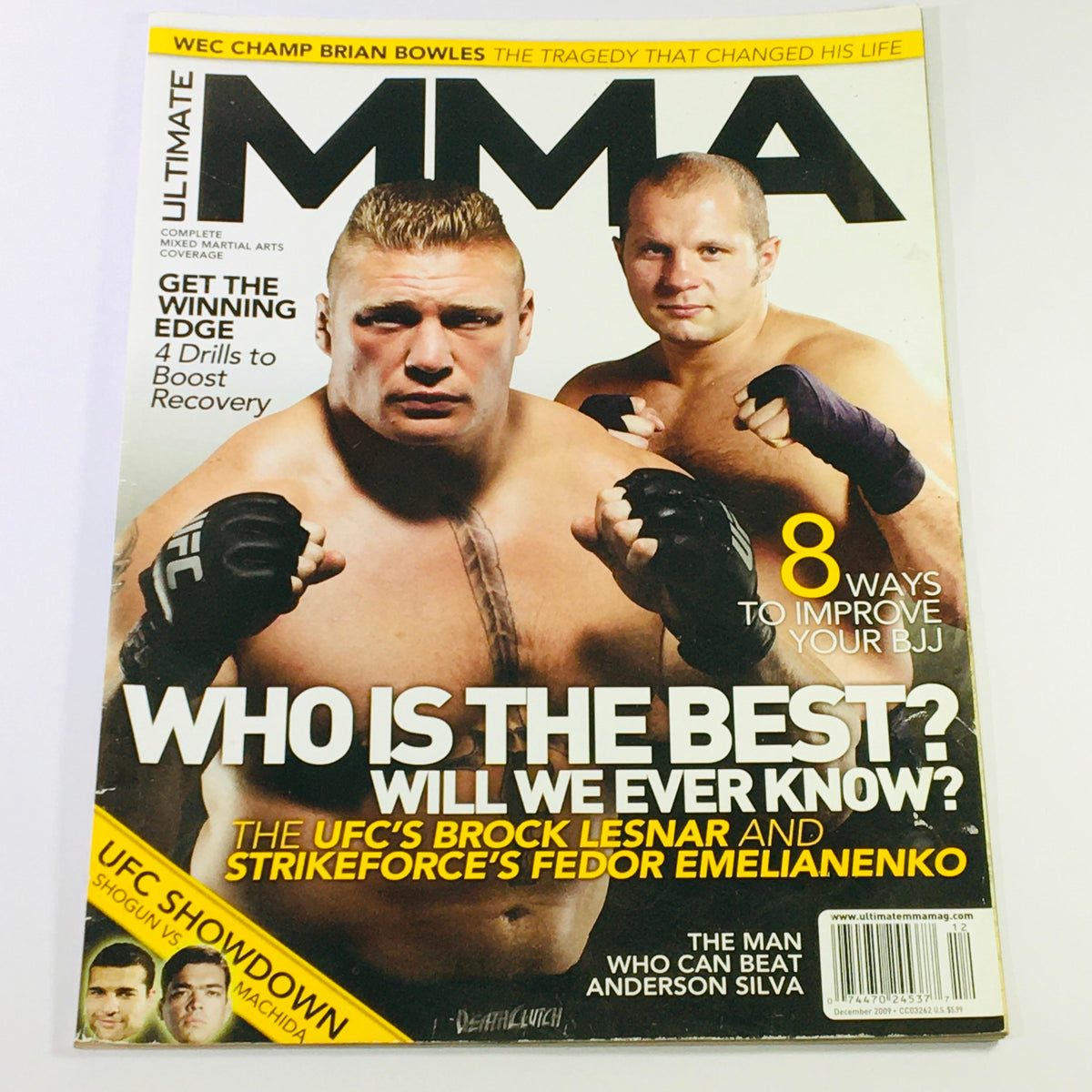 Ultimate MMA Magazine December 2009 cover featuring UFC's Brock Lesnar and Fedor Emelianenko, showcasing an intense illustration of both fighters with a headline discussing their rivalry and MMA greatness.