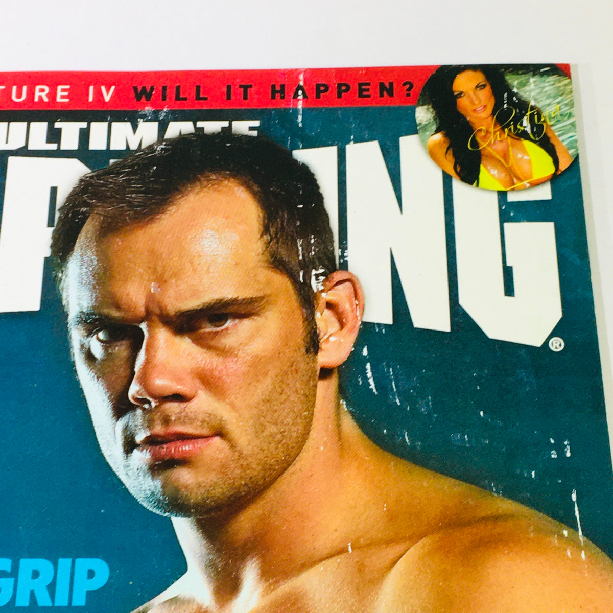 Detailed view of Rich Franklin on the cover of Ultimate Grappling MMA Magazine November 2007, emphasizing his intense demeanor and the magazine's promotional elements.
