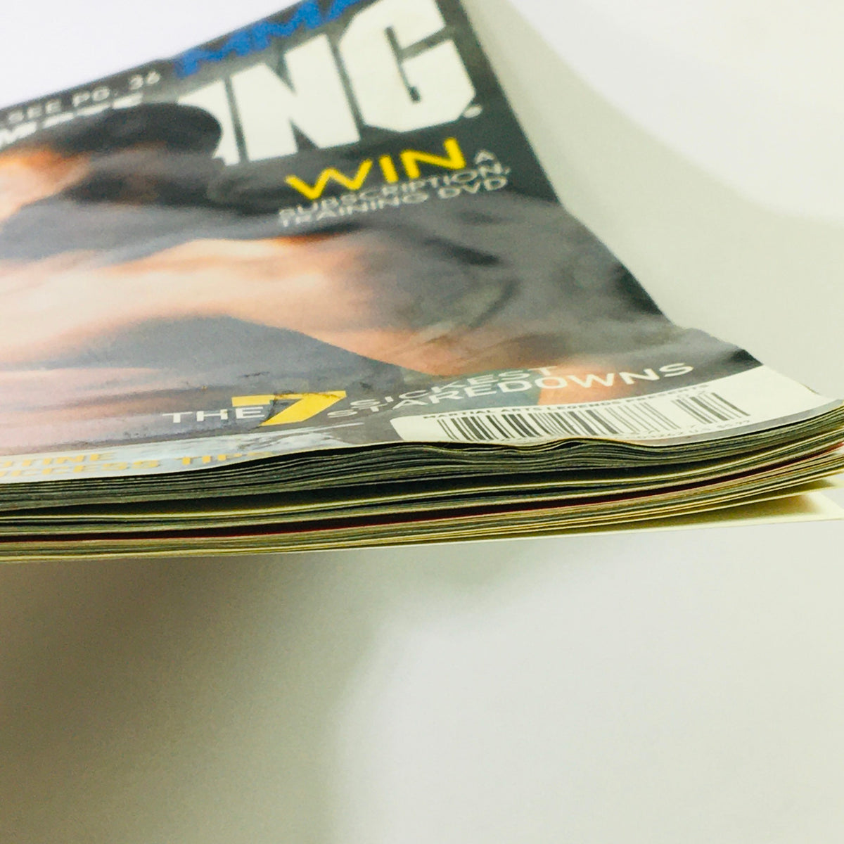 Ultimate Grappling MMA Magazine February 2009 showing the spine and edges of the magazine, illustrating its vintage condition and highlighting the collectible nature of the issue.
