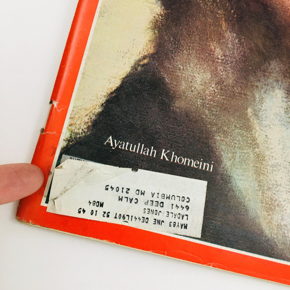 Close-up of Time Magazine January 7 1980 Vol. 115 No. 1 cover displaying a label and detailing Ayatollah Khomeini, highlighting the magazine's historic context related to the Iranian Revolution.