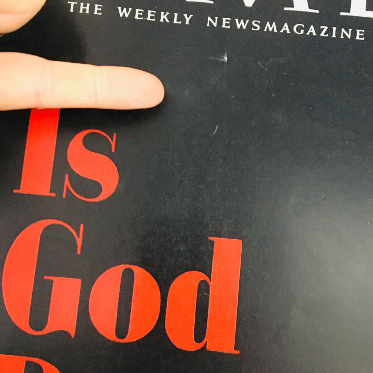 Cover detail of Time Magazine April 8 1966, Vol. 87 No. 14, showing the text 'Is God Dead?' highlighted by a finger pointing.