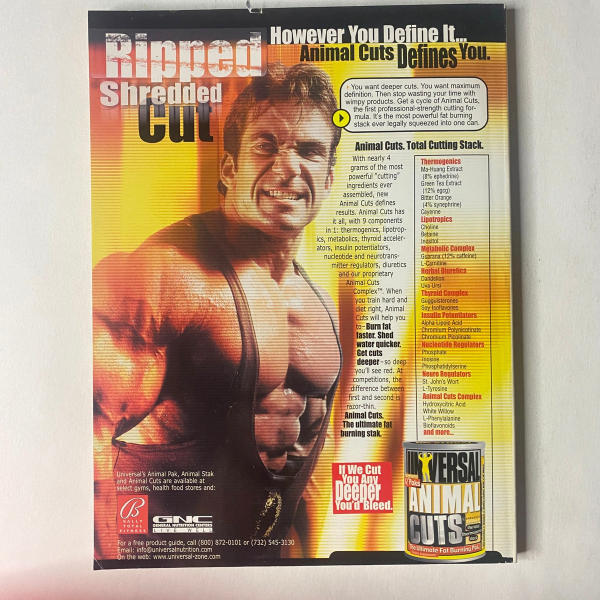 Promotional advertisement for Animal Cuts featuring a muscular male bodybuilder from the IronMan Magazine May 2001 issue titled 'IronMan Magazine – May 2001 – Chris Cormier & Andrulla Blanchette – No Label'. The ad emphasizes the benefits of Animal Cuts, a supplement designed for maximum fat loss, showcasing vivid graphics and key benefits of the product.