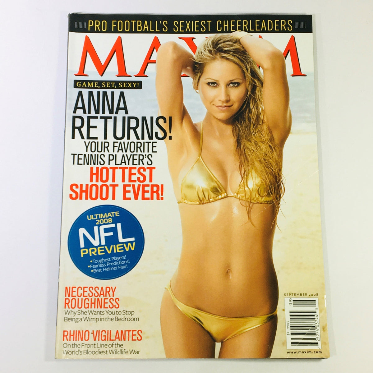 Cover of Maxim Magazine September 2008 featuring Anna Kournikova in a gold bikini, showcasing the iconic tennis star's return and marking it as her hottest shoot ever.