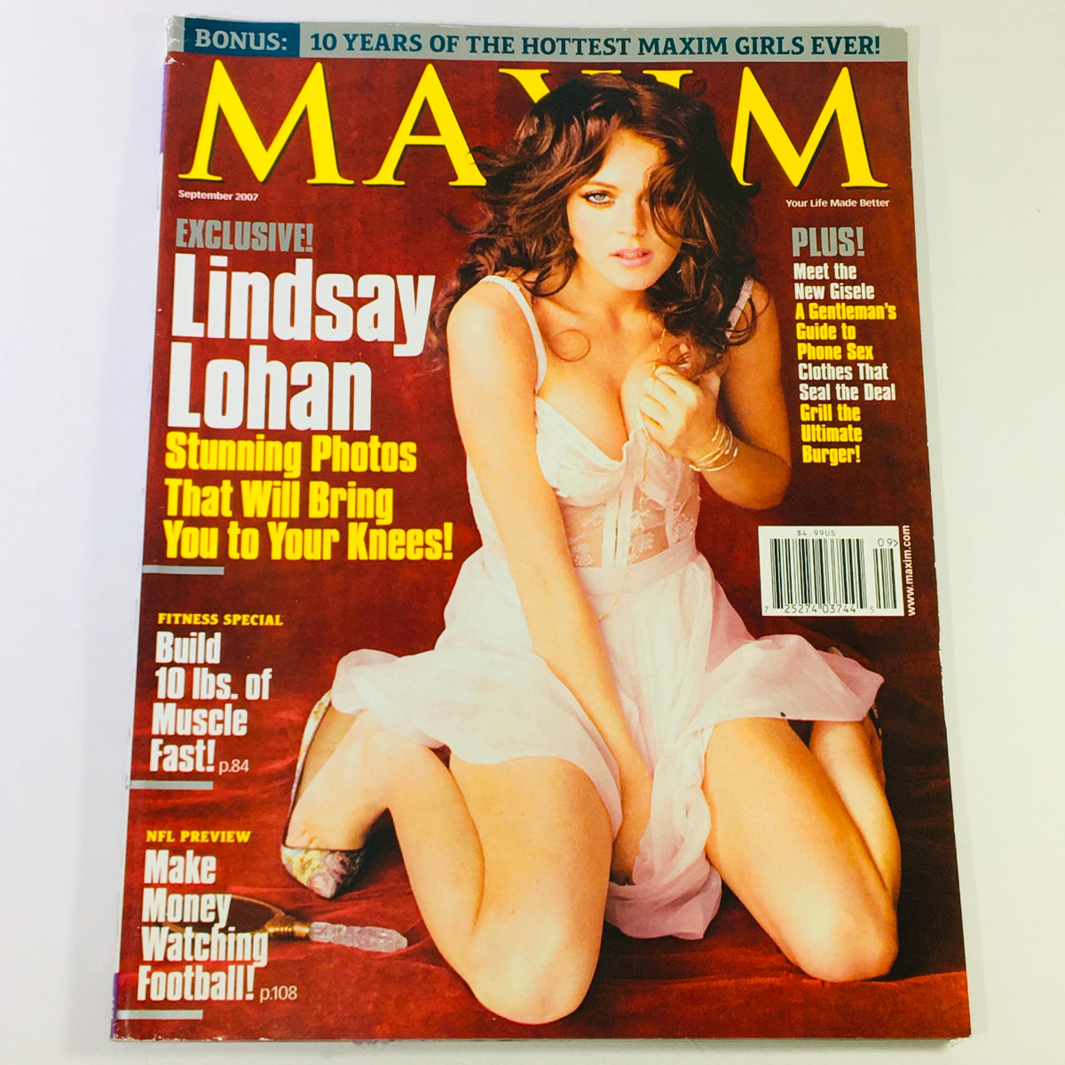 Cover of Maxim Magazine September 2007 featuring stunning photos of Lindsay Lohan, showcasing her beauty and allure alongside an NFL preview.